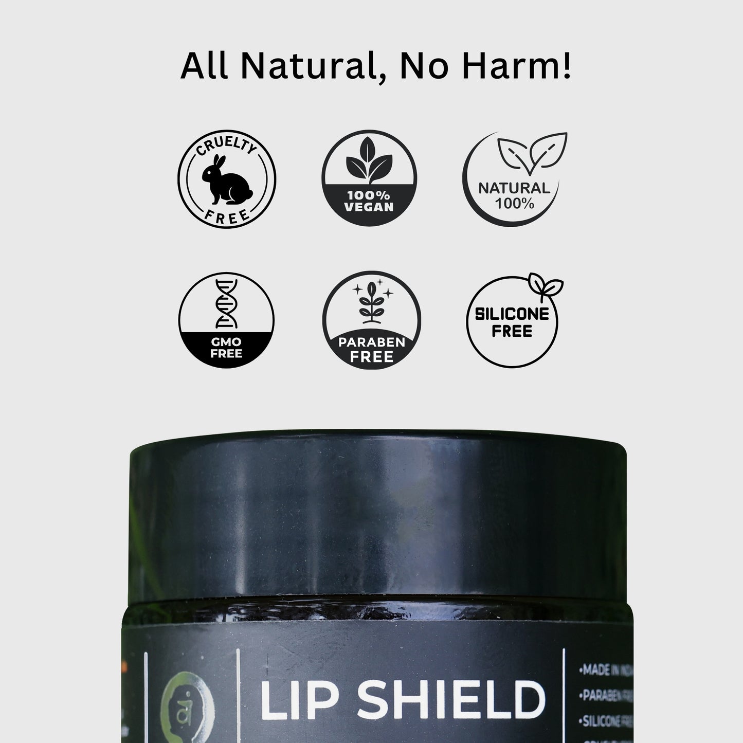 Tatha lip shield with SPF in a black jar with black cap, all-natural, cruelty-free, 100% vegan, GMO-free, paraben-free, silicone-free lip balm.