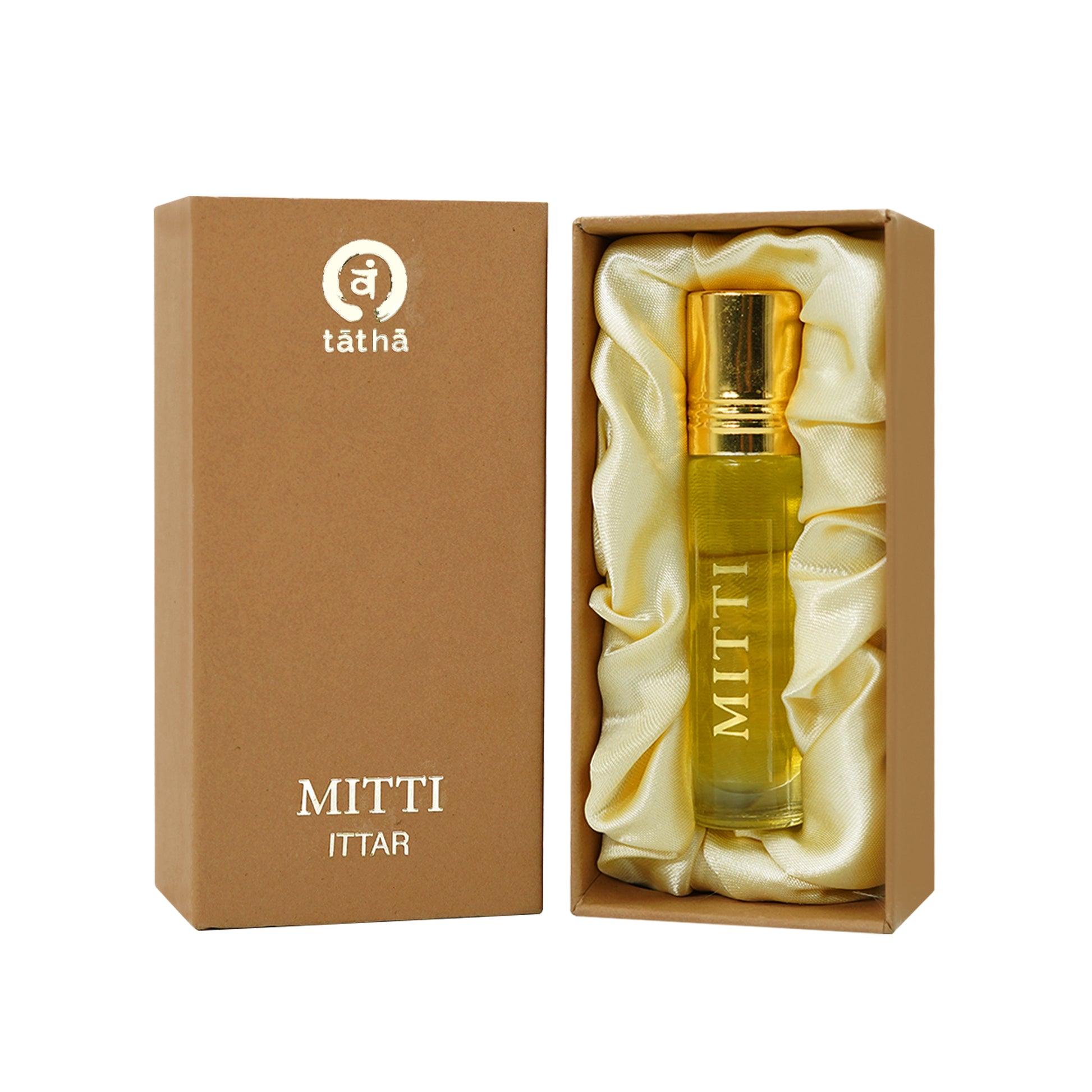Tatha Mitti Attar 10ml in a white glass bottle with golden cap, shown inside its box both open and closed.