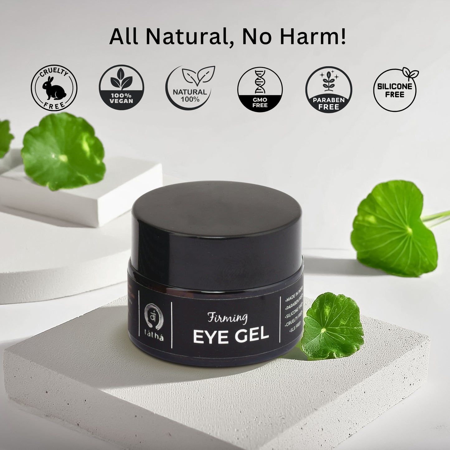 Tatha Firming Eye Gel with jar and cap, displayed alongside icons or labels highlighting its all-natural, no-harm formula: cruelty-free, 100% vegan, GMO-free, paraben-free, and silicone-free.