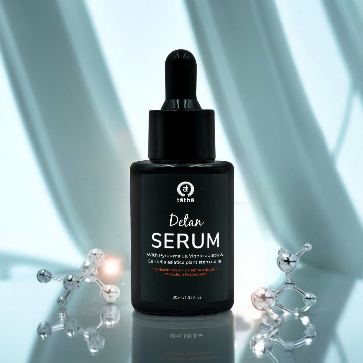 Tatha Brand Detan Serum in a sleek black glass bottle with a serum dropper cap, showcasing a premium skincare product.