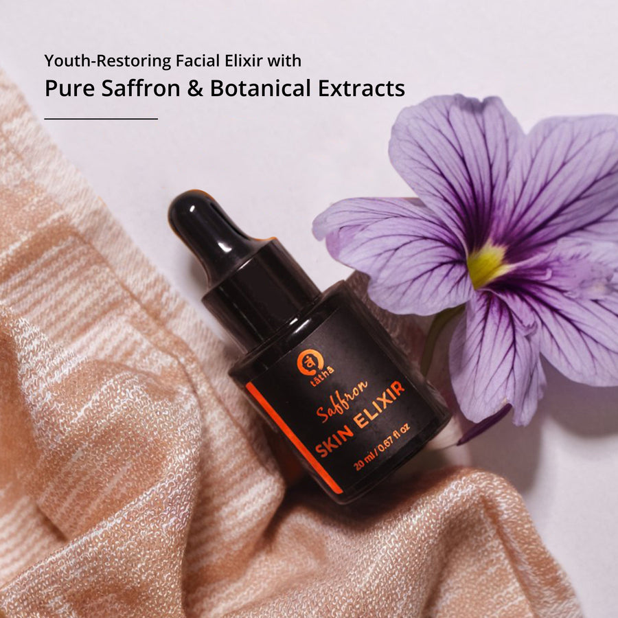 Tatha Saffron Skin Elixir in a 20ml black glass bottle with dropper cap – youth-restoring facial elixir made with pure saffron and botanical extracts